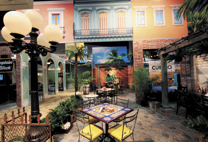 To promote its new Havana Honeys cigars, Scandinavian Tobacco Group Lane Ltd. turned its 50-by-70-foot exhibit into a veritable Caribbean oasis. In homage to Havana, Cuba, STG-Lane's booth featured tropical plants and décor, bright colors, and open-air courtyards.