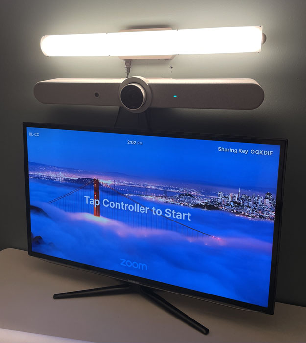 Brightline cMe3 huddle room light with Logitech Rally Bar and Logitech Scribe whiteboard camera