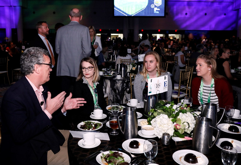 Jeff Provost shares his thoughts with finalists CeCealia Schultz, Lexie Tabbert, and winner Kylee Beaver before the award presentation.